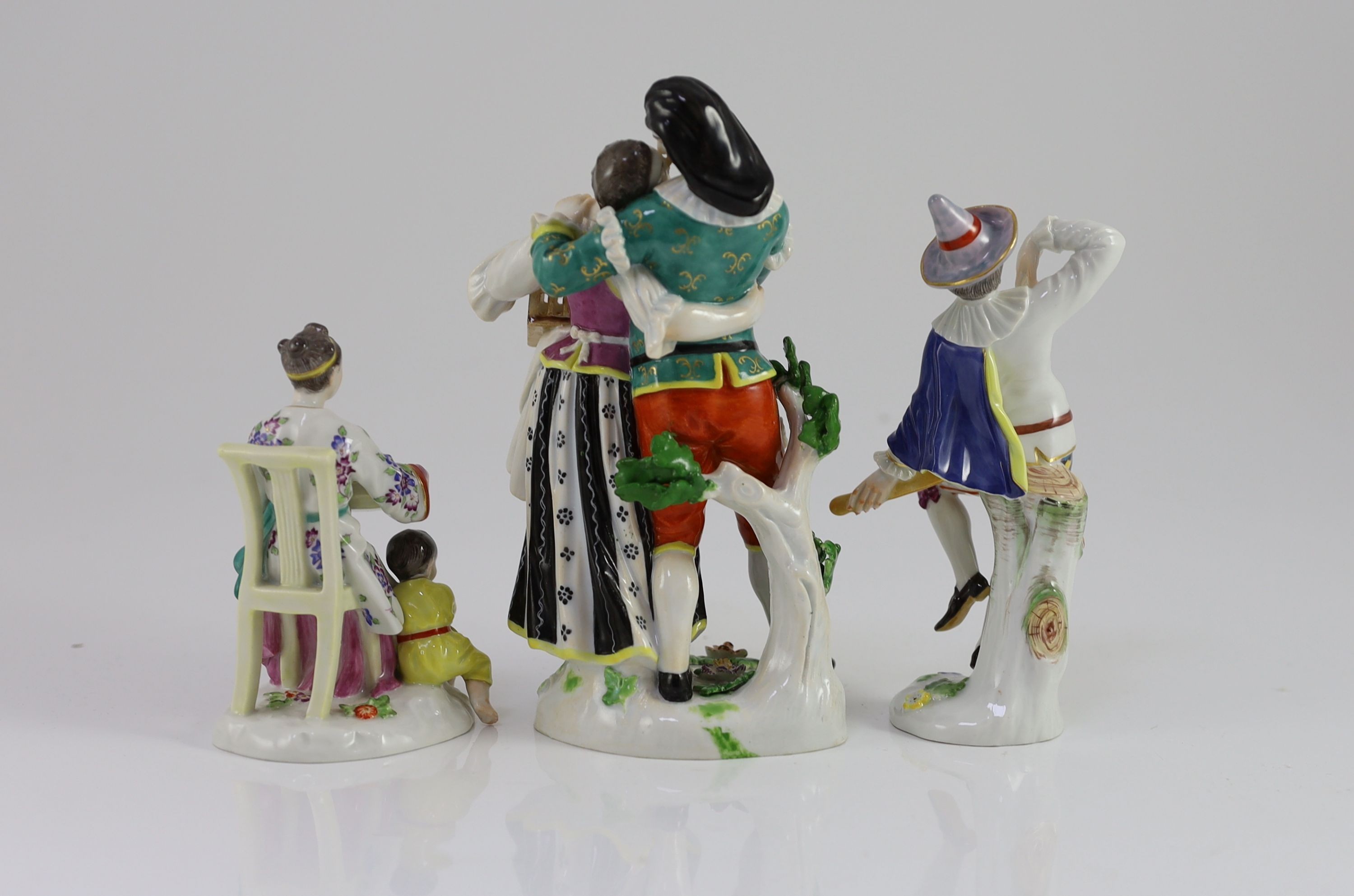 A Meissen group of Scaramouche and Columbine, a similar group of a Chinese mother and child and a figure of Harlequin, all 20th century, 11 - 17.5cm high, Scaramouche group restored (3)